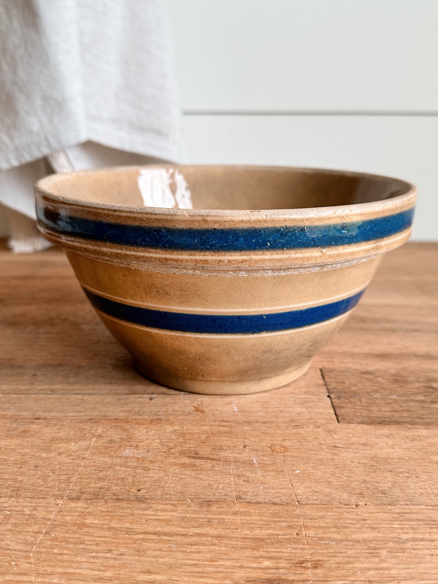 Beautifully Stained Yellow Ware Stoneware Bowl with Blue Stripes
