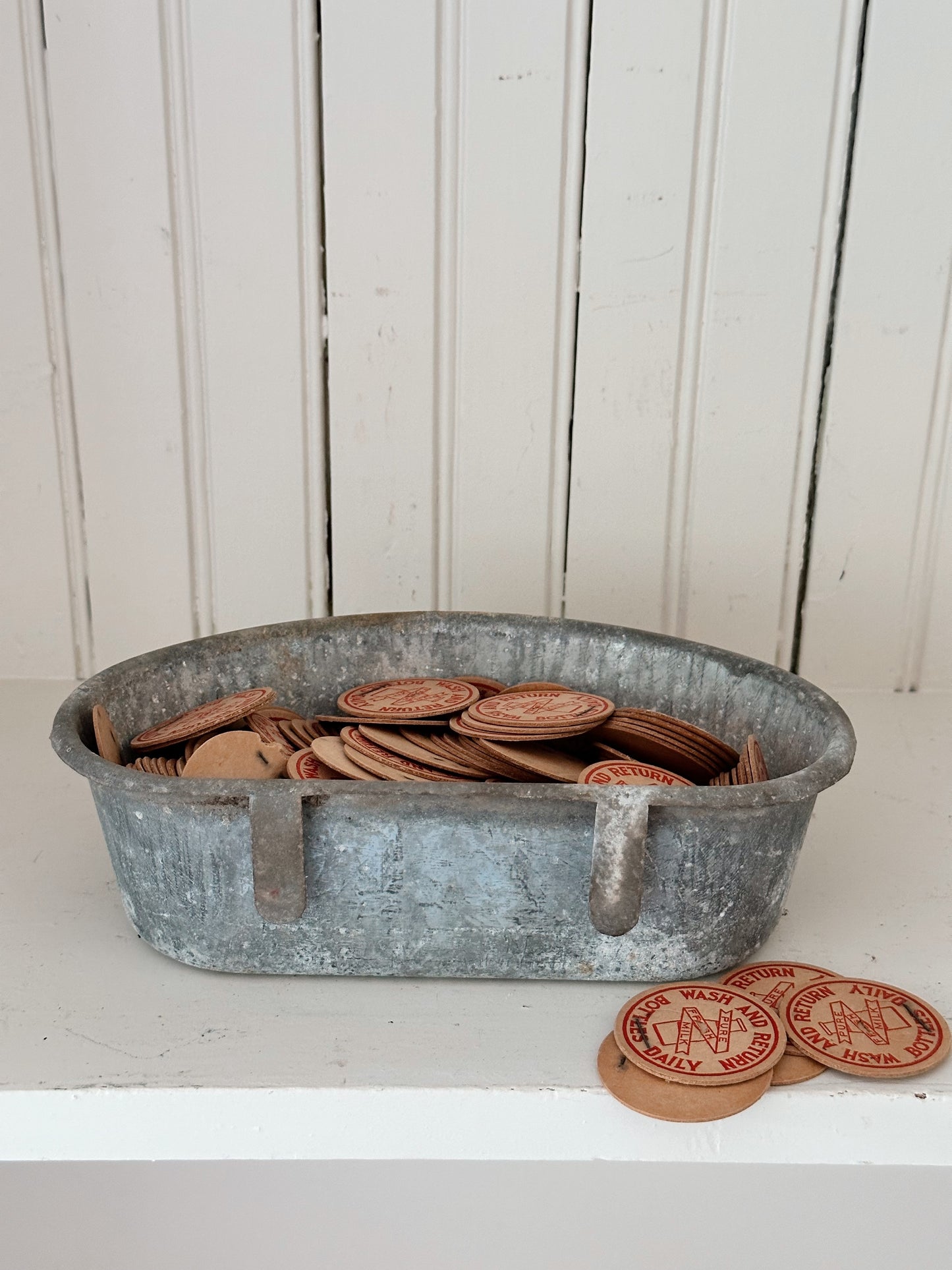 Vintage Galvanized Feeder Filled with Vintage Milk Bottle Caps