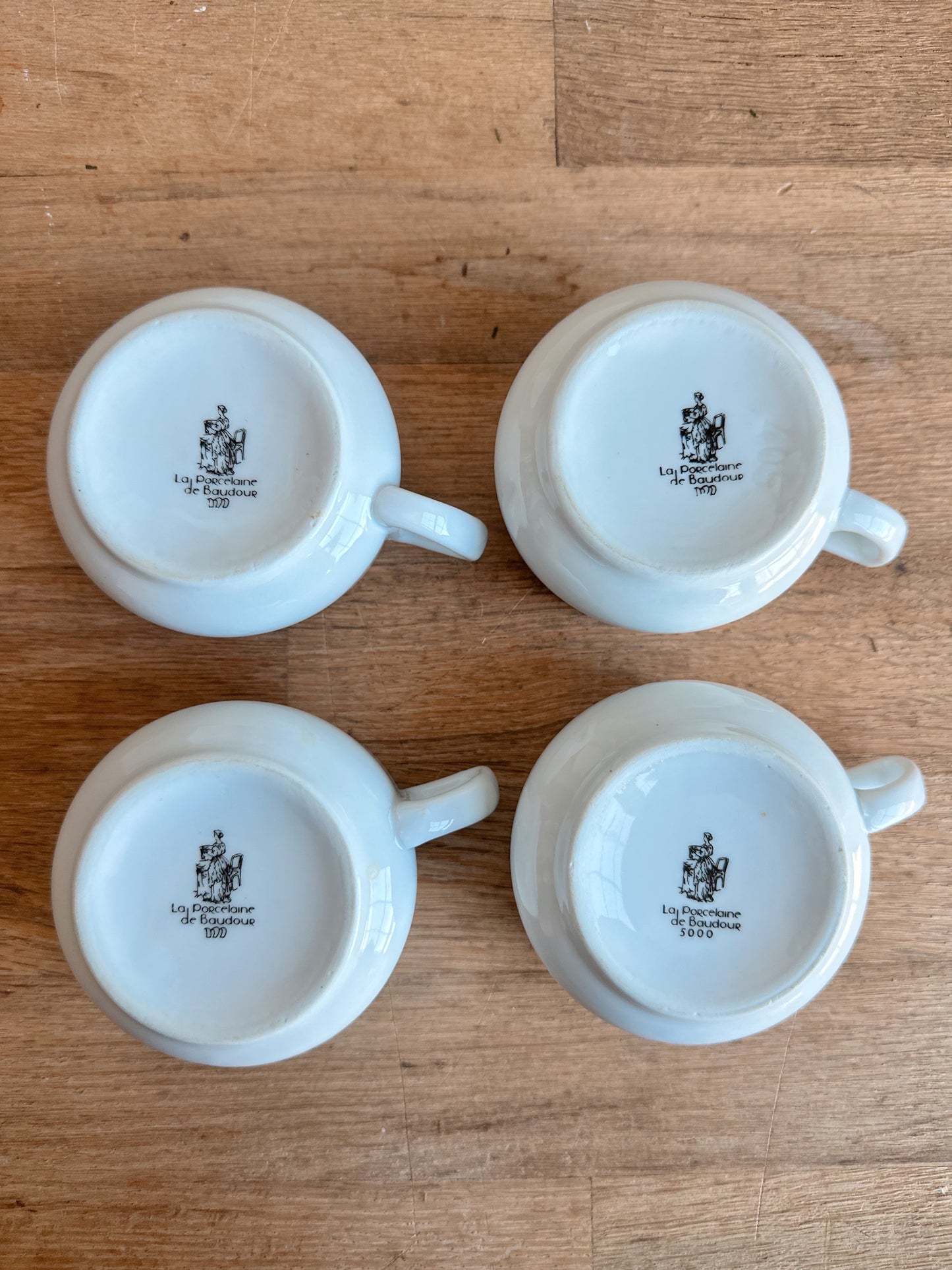Set of Four French La Porcelaine de Baudour Mugs