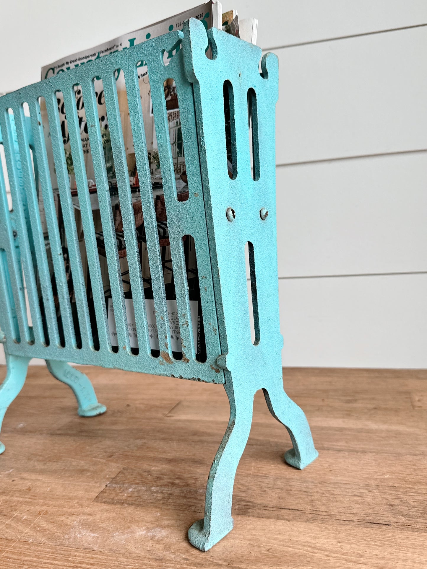 Vintage Cast Iron Magazine Holder