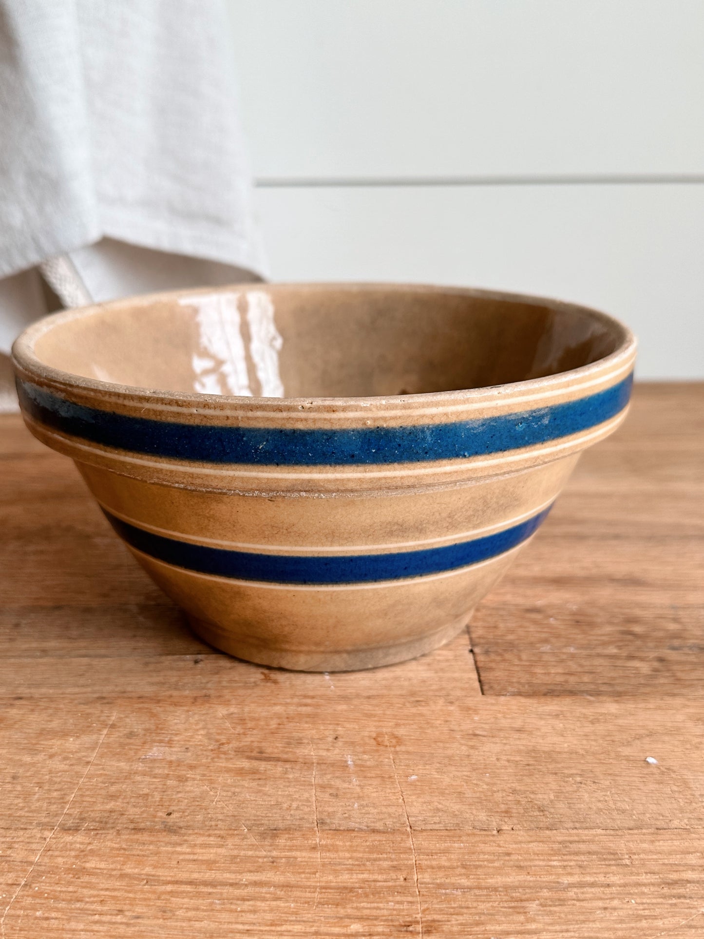 Beautifully Stained Yellow Ware Stoneware Bowl with Blue Stripes