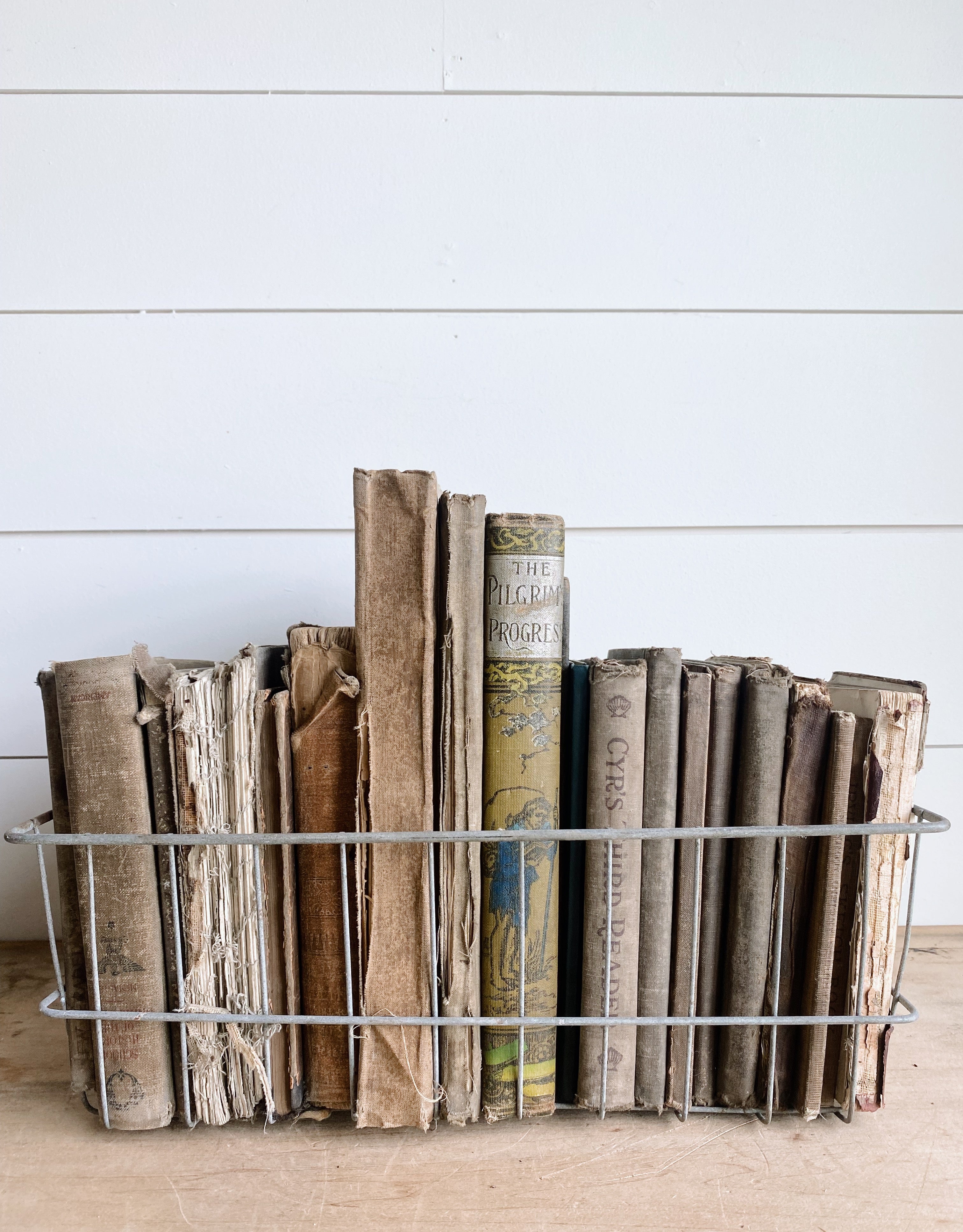 Collection of Vintage & Antique Books in a Vintage Wire Basket
