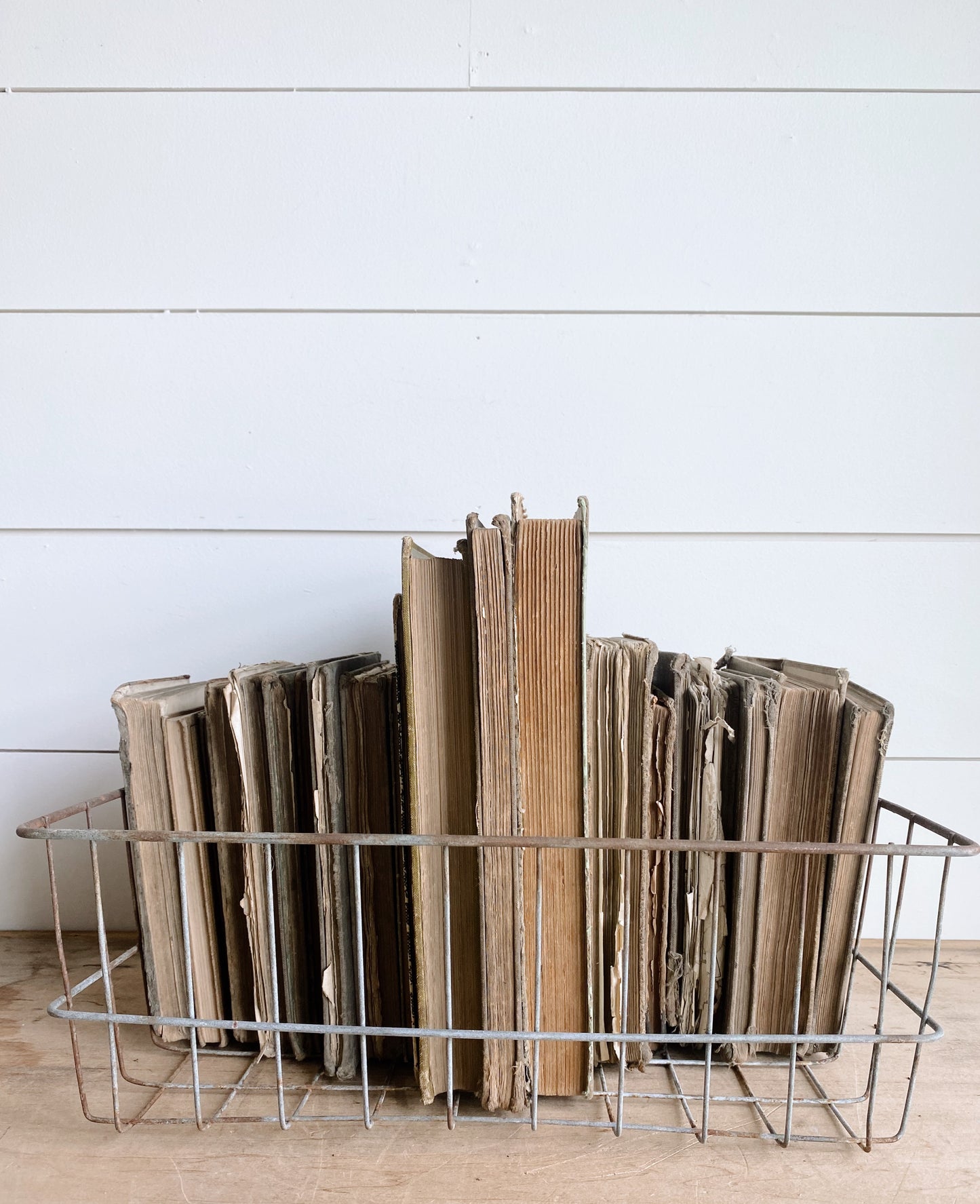 Collection of Vintage & Antique Books in a Vintage Wire Basket